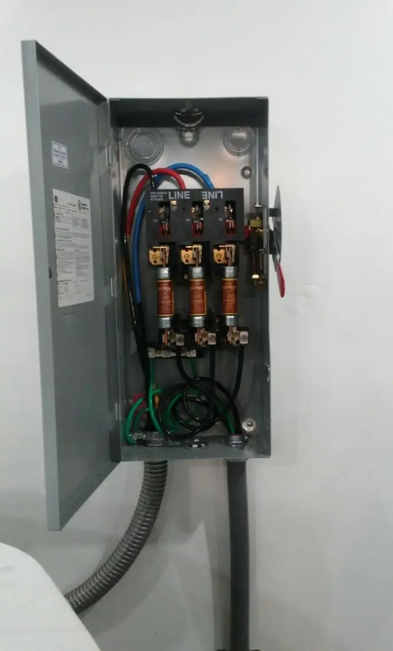 Three-phase disconnect switch installed for Smoke Detector Installation in Tipton