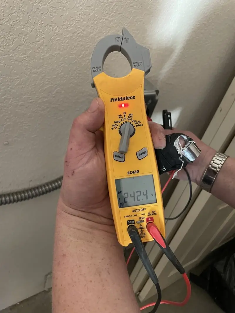 Voltage testing with clamp meter during Aluminum Wiring Replacement in Tipton